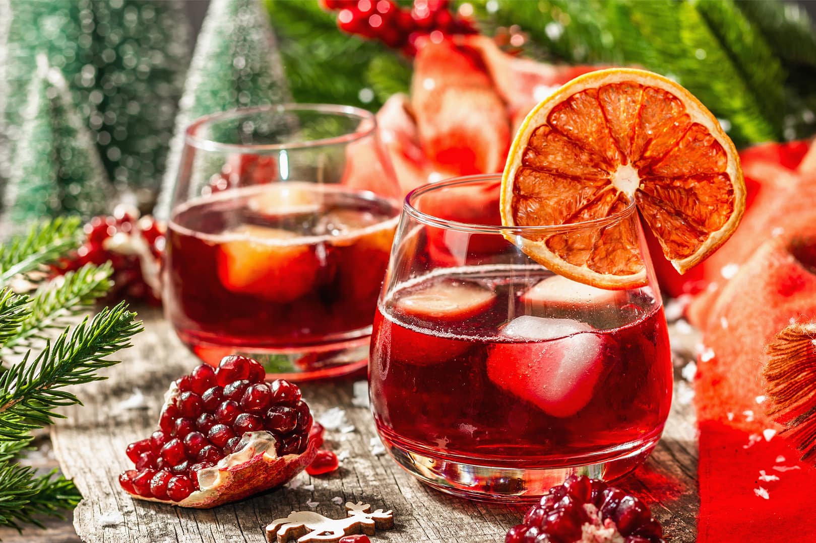 Non-alcoholic cokctail with fruits syrup and ice for Christmas
