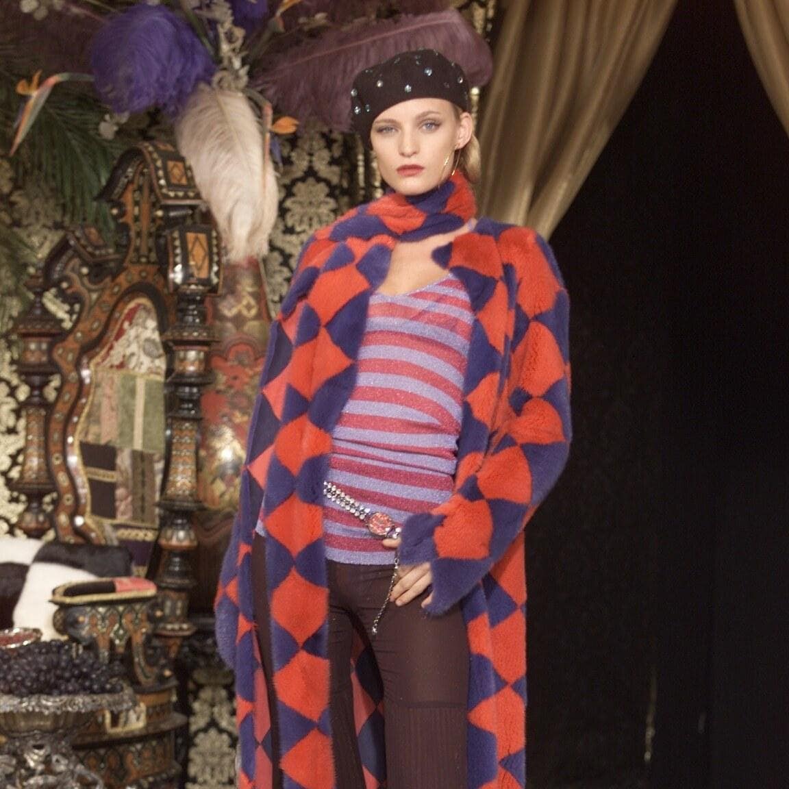 Female model wearing Dolce & Gabbana black wool beret with crystals, A/W 2000