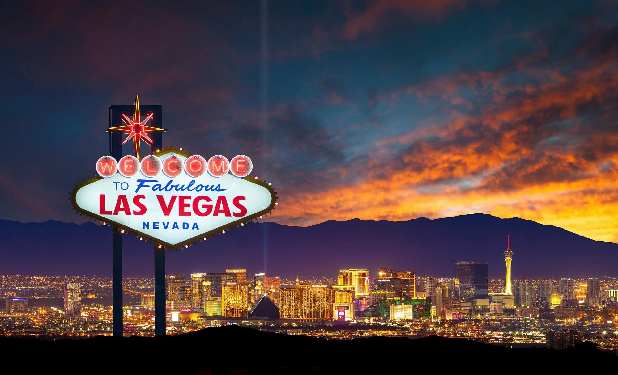 A beautiful sunset over a calm ocean with vibrant orange in Las Vegas