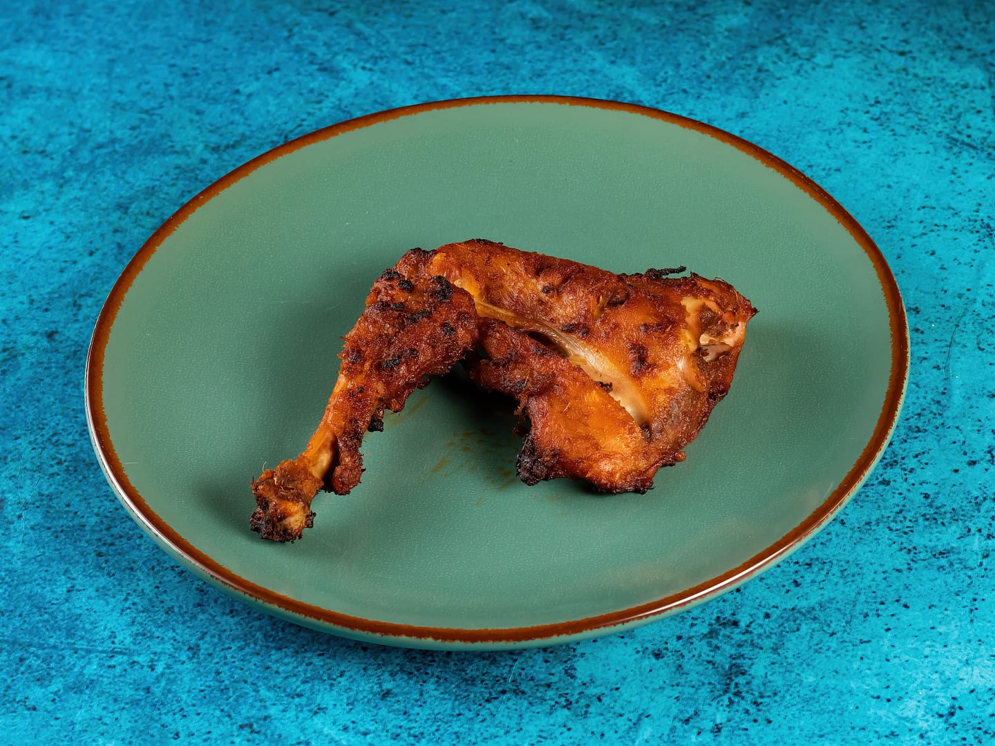 BBQ Chicken on a green plate