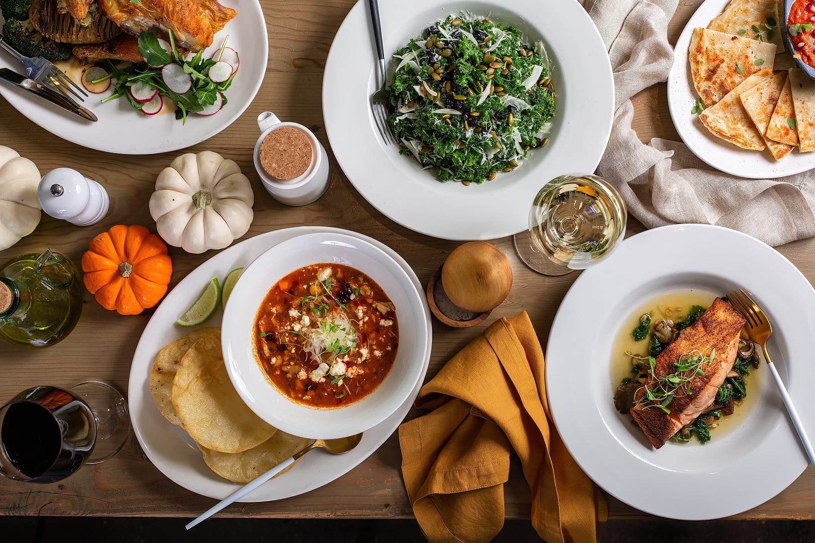 Fall dinner table overhead shot with salad and entrees