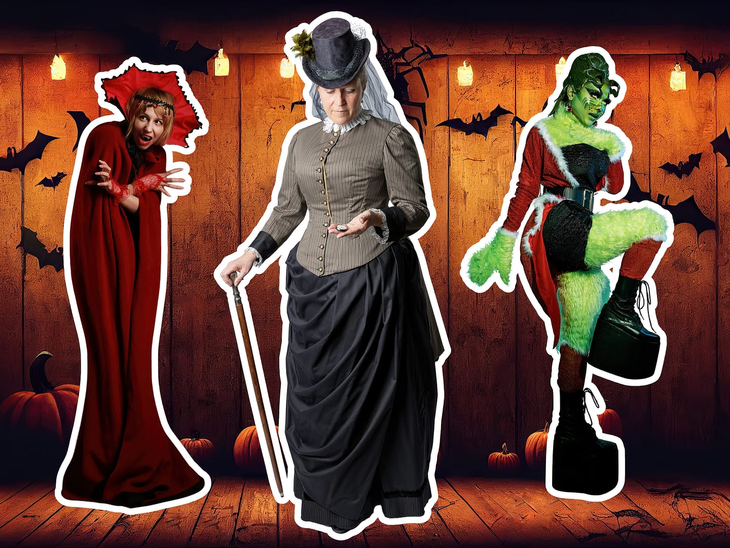 Three women in Halloween costumes: one as Red Riding Hood, another as a Victorian lady with a cane, and the third as a green-skinned creature in a black and red outfit, stand against a wooden bat-decorated background