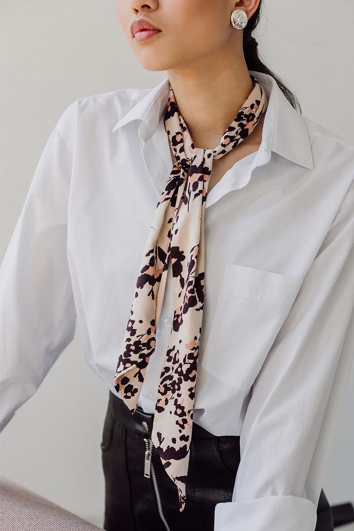 Woman with leopard print scarf