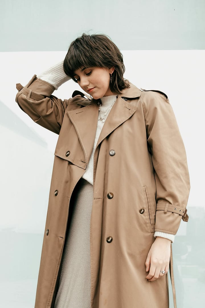 Woman wearing khaki long coat