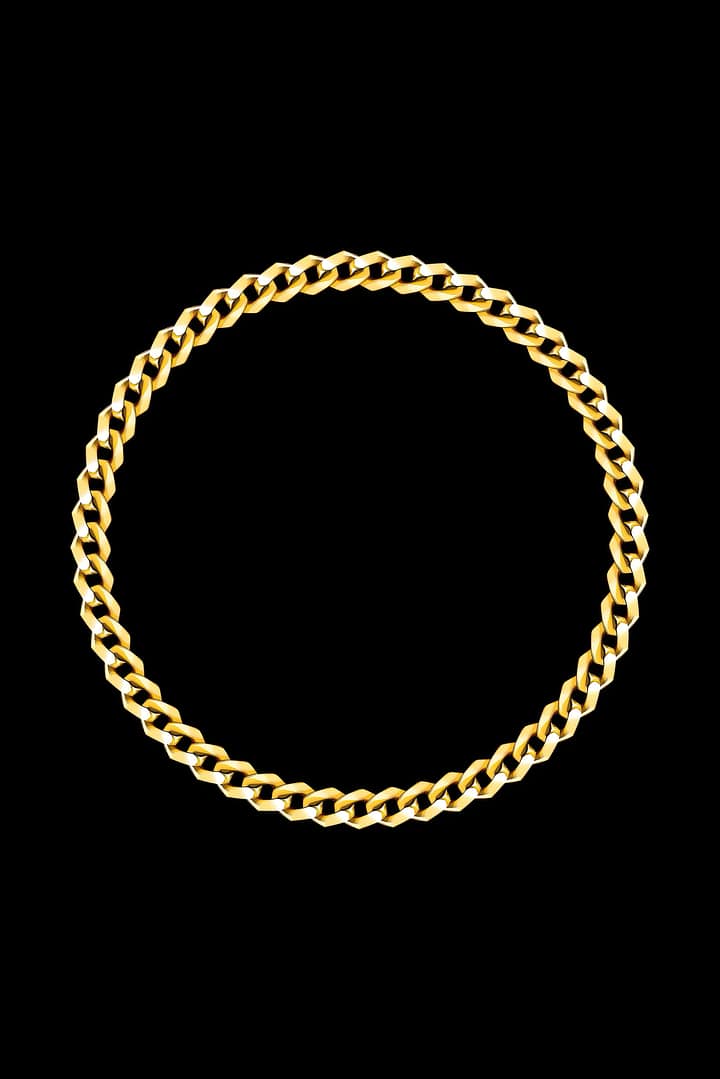 Round jewelry gold chain on black background