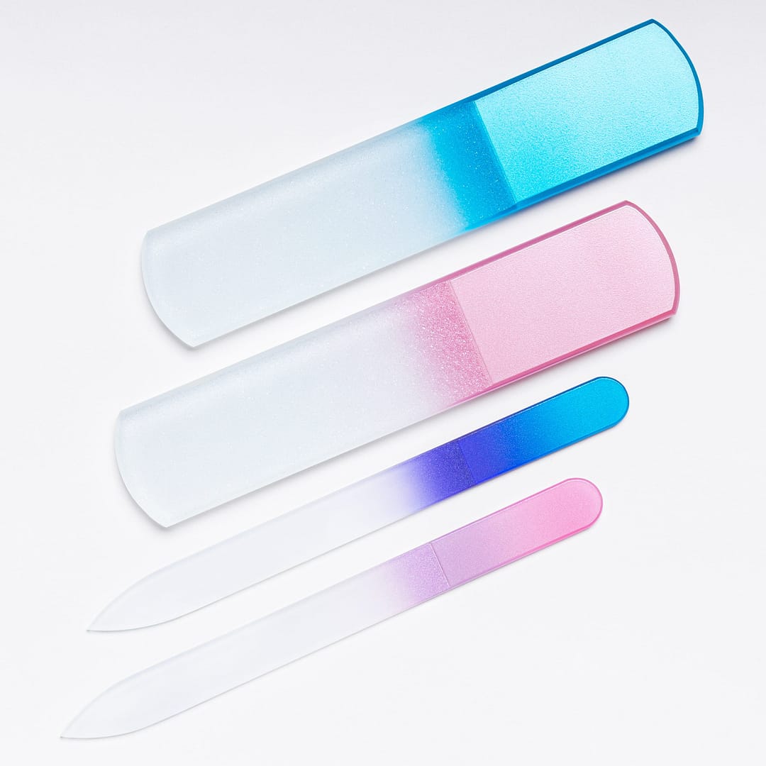 Various glass nail file kit with light grey backdrop