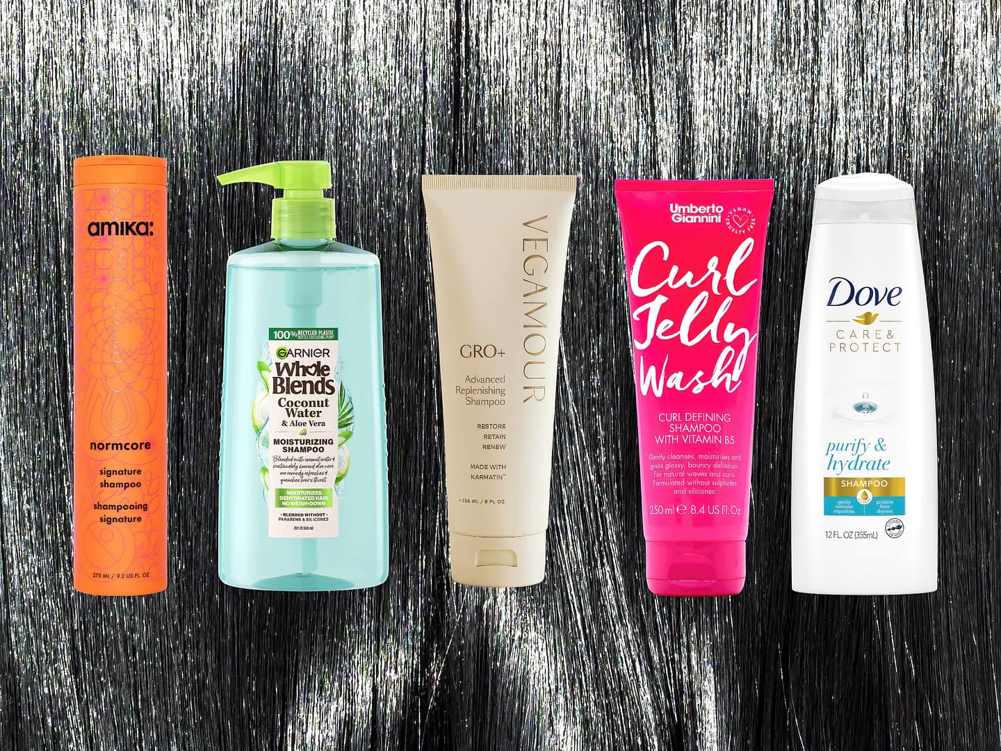 Five different best shampoos lined up against a shiny straight black hair background or beautiful smooth brunette hair backdrop