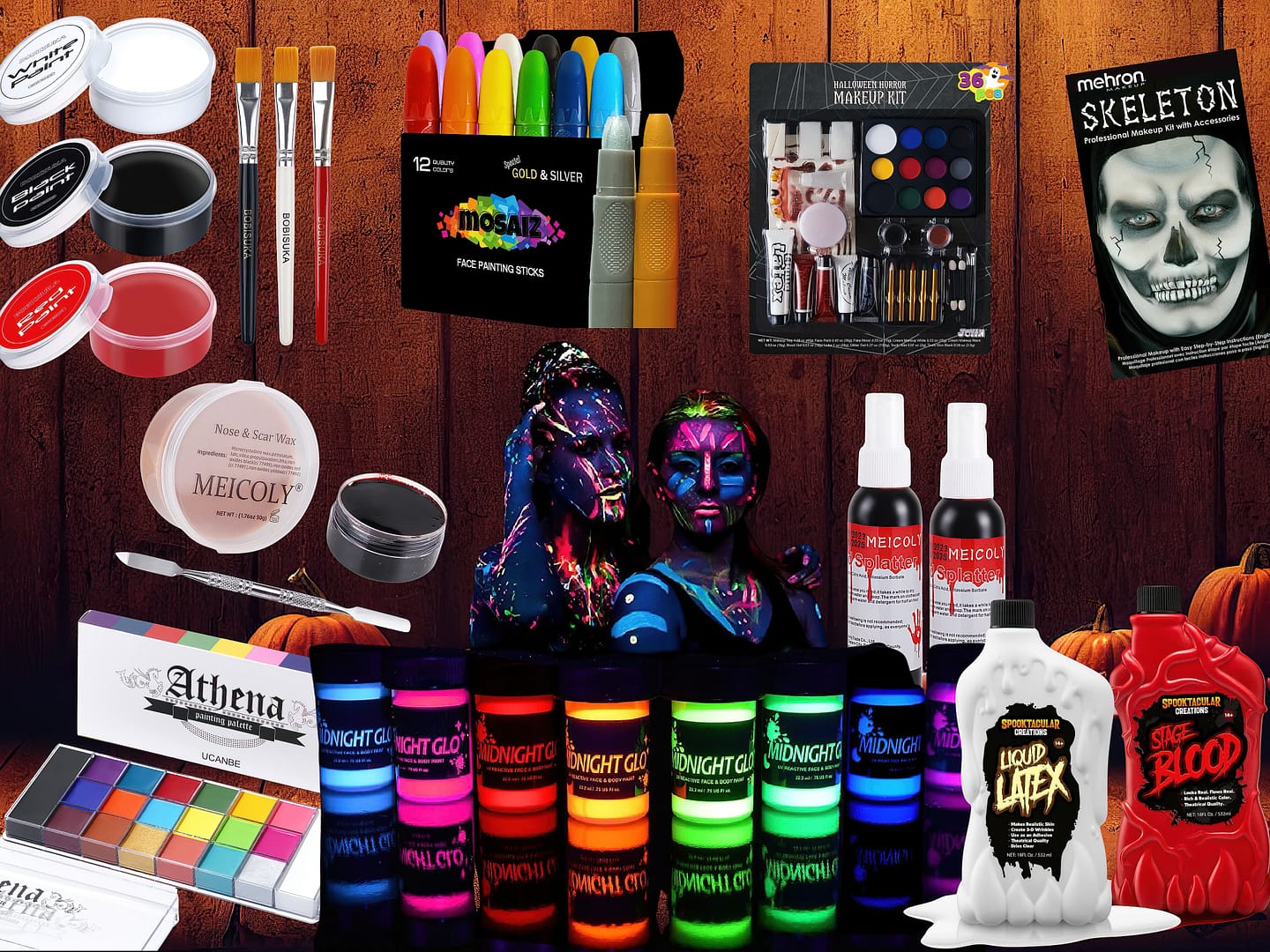 Halloween makeup products and decor on warm-colored wooden background