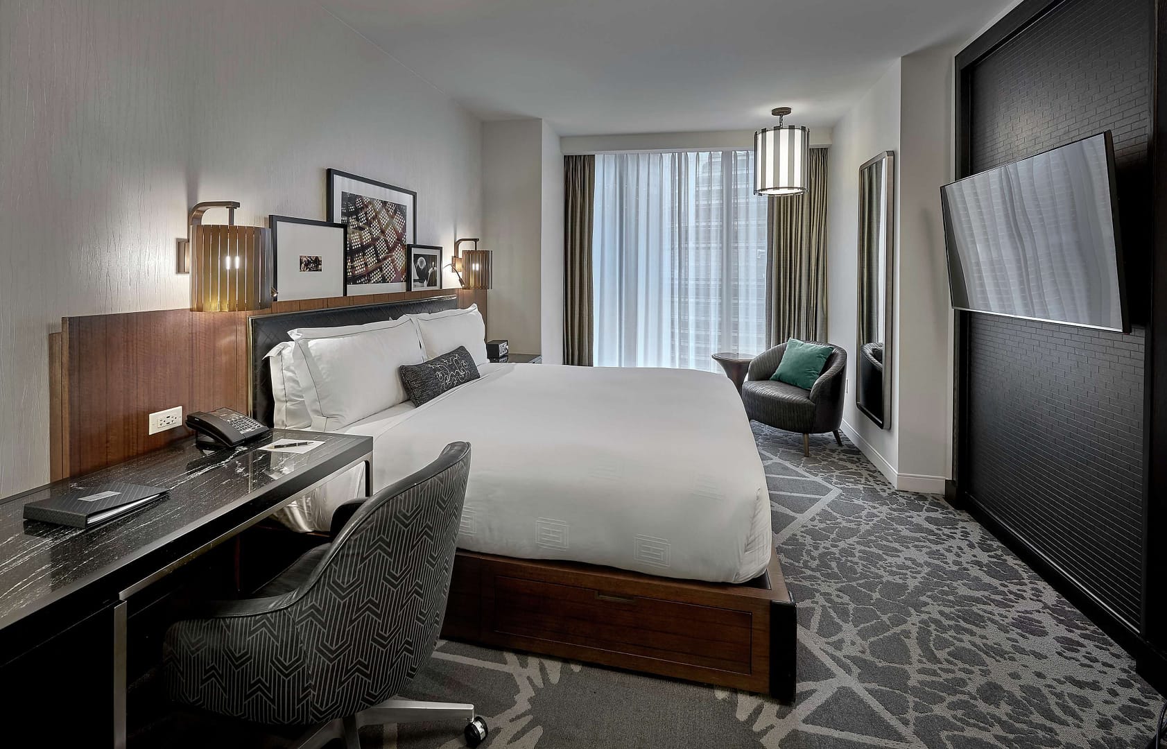 Bedroom view of LondonHouse Chicago, Curio Collection by Hilton