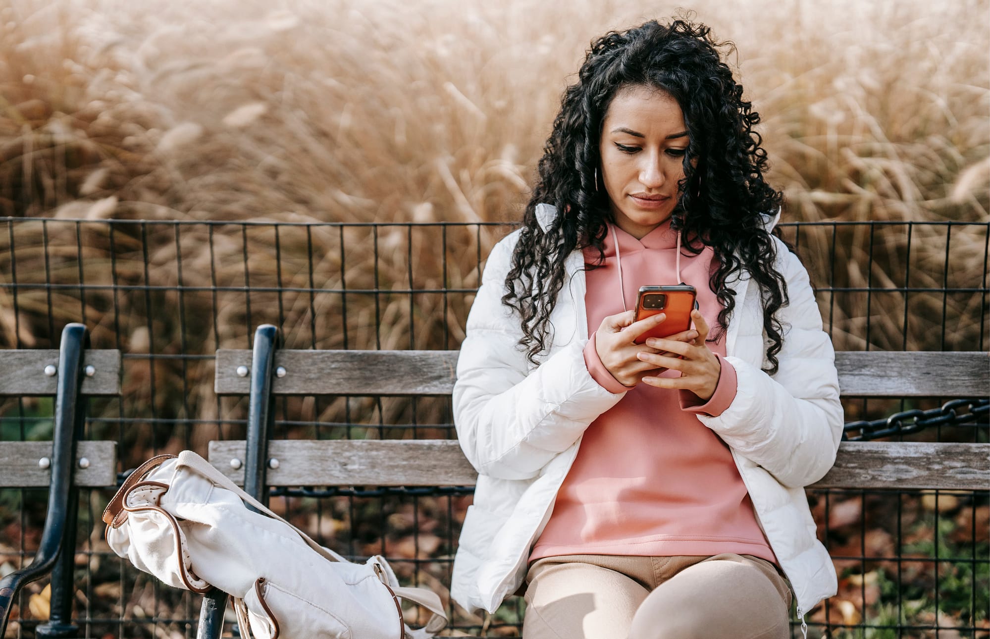 An anxious woman waiting for reassurance and emotional validation in a relationship.