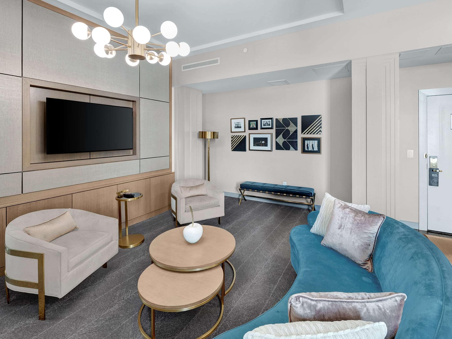 Living room view of Tulsa Club Hotel, Curio Collection by Hilton