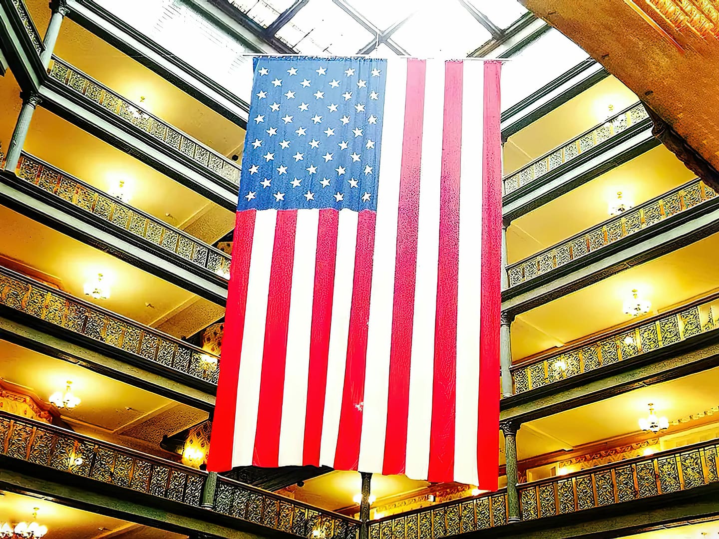 American flag hanging inside a hotel building