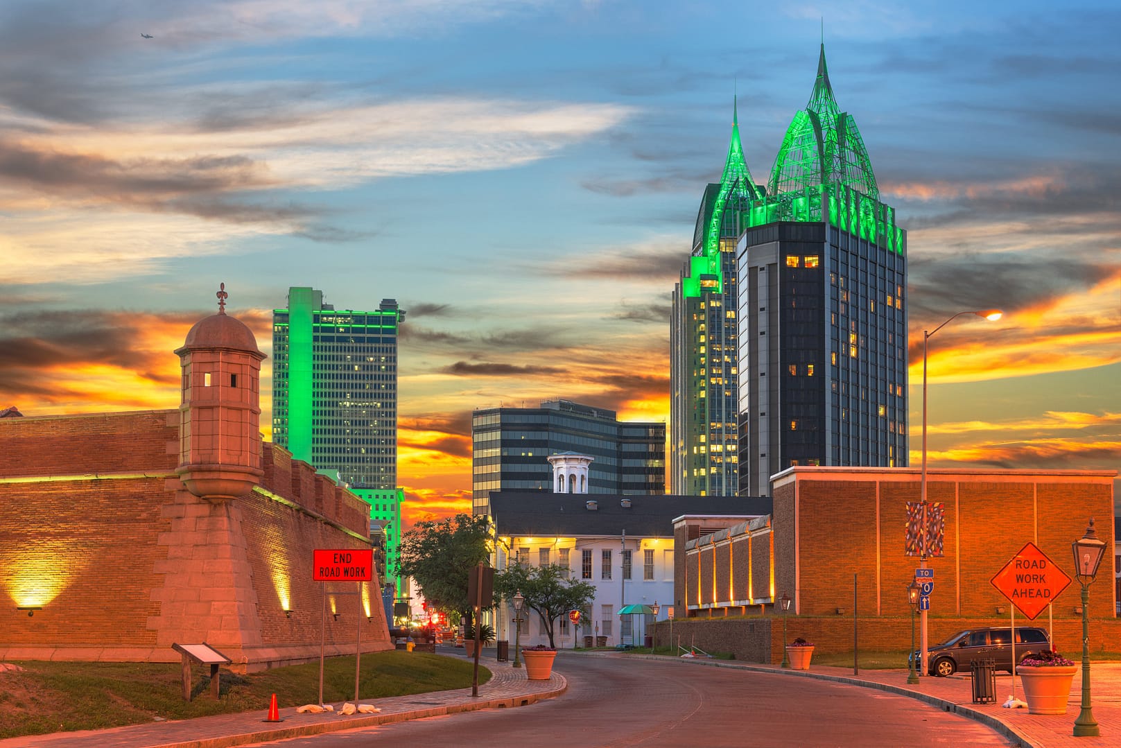 Mobile, Alabama, USA downtown skyline with Fort Conde's corner turret at dusk