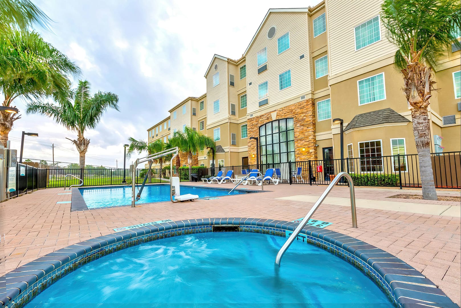 Pool view of Staybridge Suites Brownsville, an IHG Hotel
