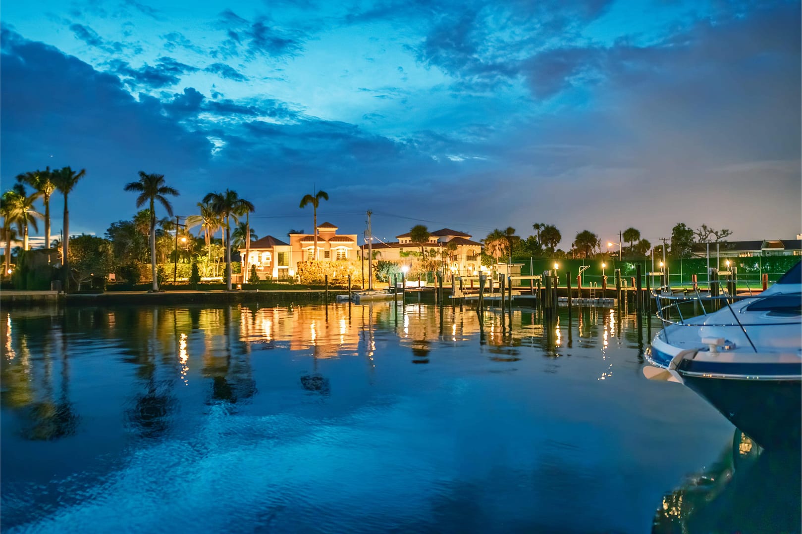 Boca Raton buildings along Lake Boca Raton at sunset, Florida