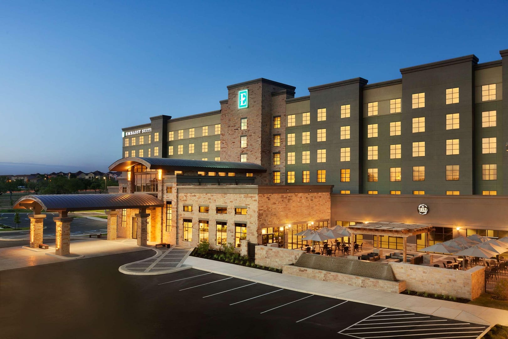 Building view of Embassy Suites by Hilton San Antonio Brooks Hotel & Spa