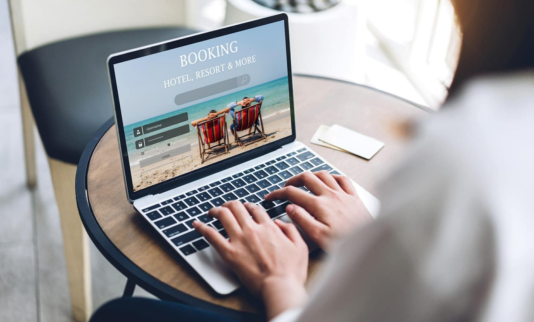 Portrait of woman using laptop computer for hotel and resort booking online summer holiday travel system plan searching information weekend vacation trip