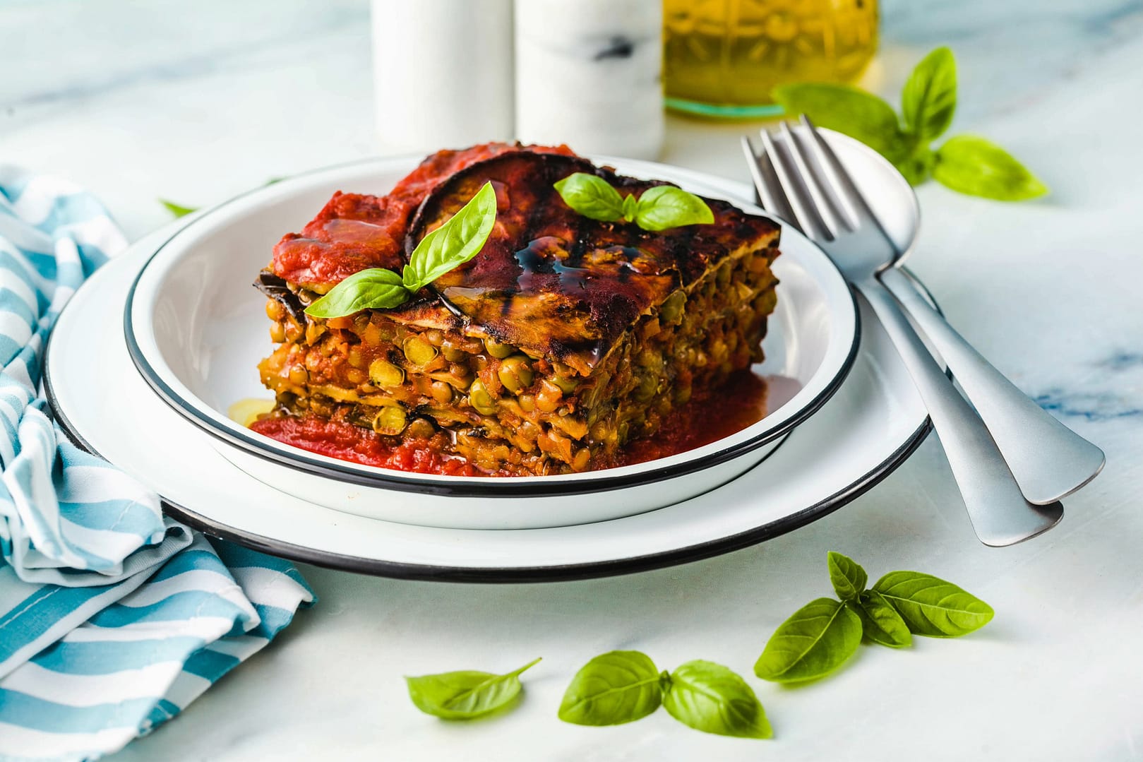 Gluten-free vegan lasagna. From grilled eggplant, green peas, lentils and vegetables