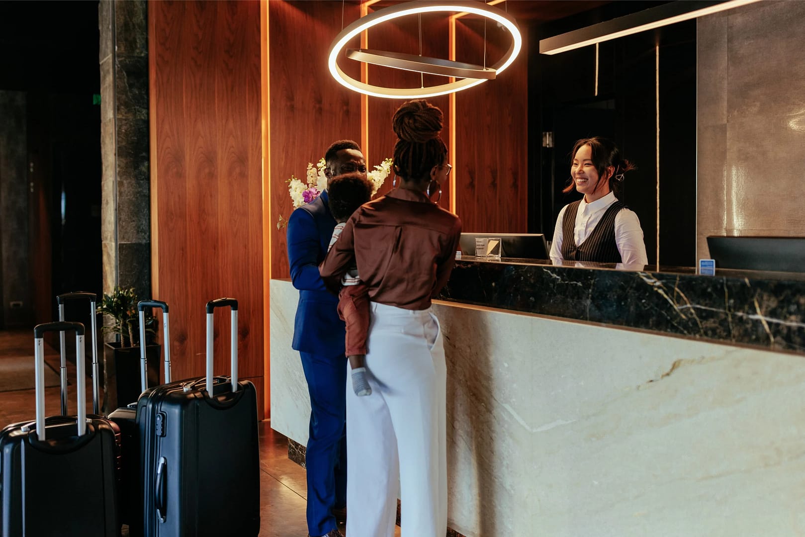 Hotel guests checking in